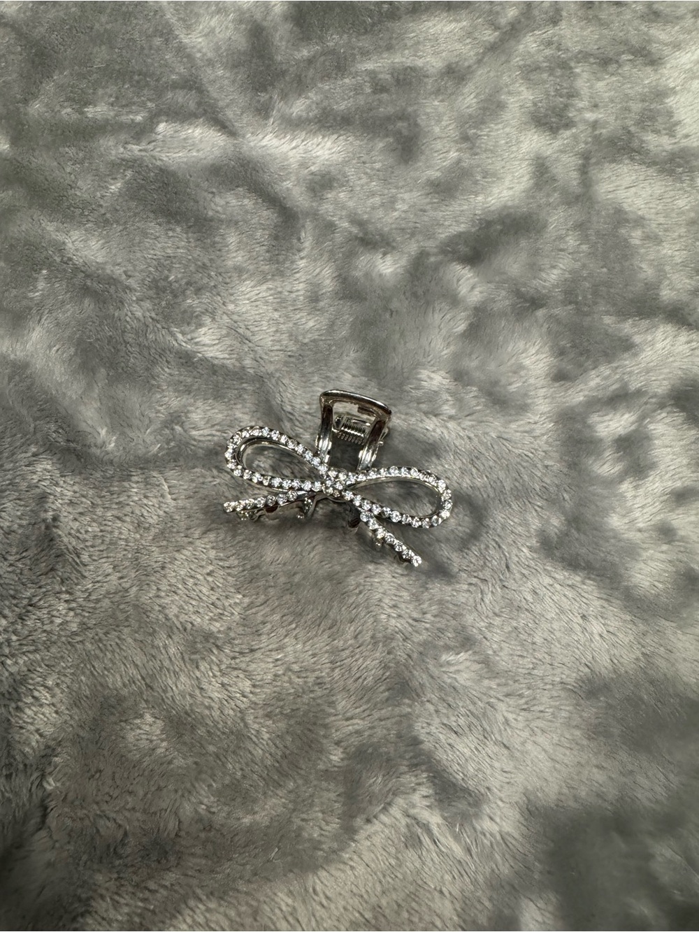 Silver bow clip with rhinestone